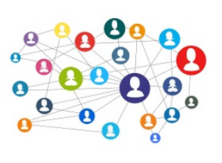 Kreise mit Kopfsymbolen die mittels Linien verbunden sind. es soll ein Netzwerk symbolisiert werden.
